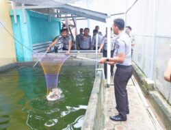 Dukung Program Ketahanan Pangan ,Lapas Narkotika Panen Ikan Nila dan Bagikan Sembako